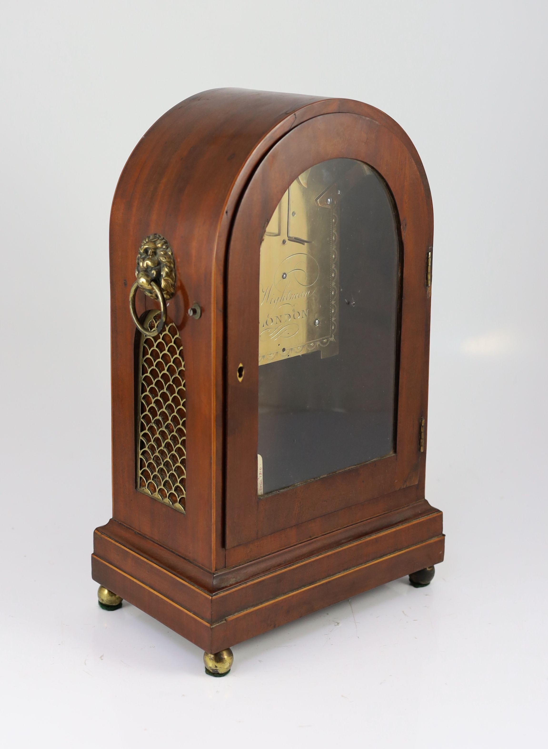 A Regency mahogany mantel timepiece H. 44cm. W. 27cm. D. 17cm.